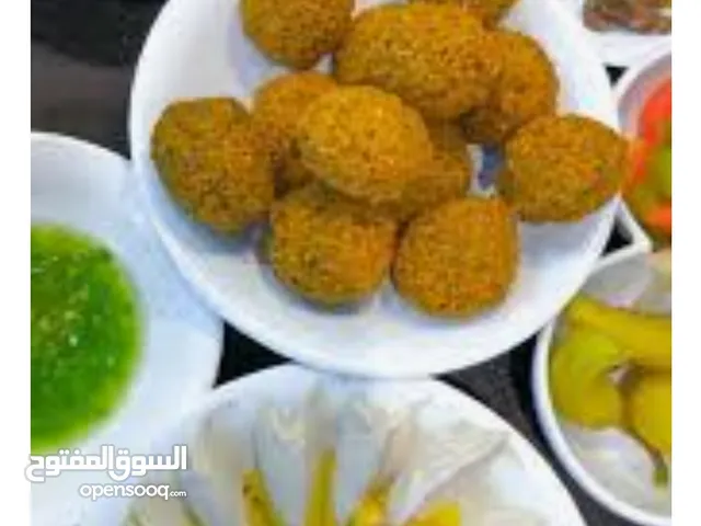 مطعم حمص وفلافل وسناكات للضمان
