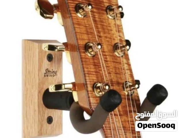 حامل  عود او قيتار يتعلق  بالطوفه  هما حبتين  بالعلبه ب 10 دنانير  نفس اللي  بالصوره  بالضبط