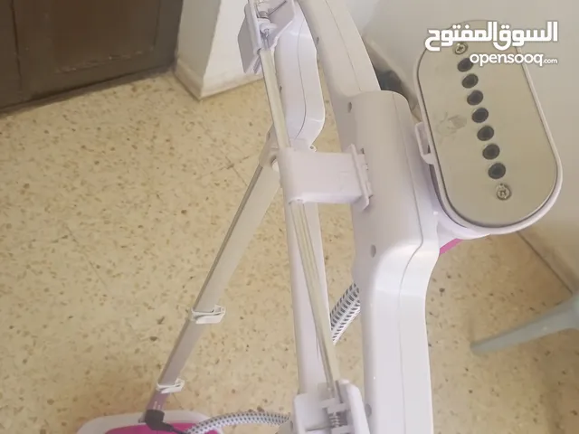 مكوى بخار عمودي