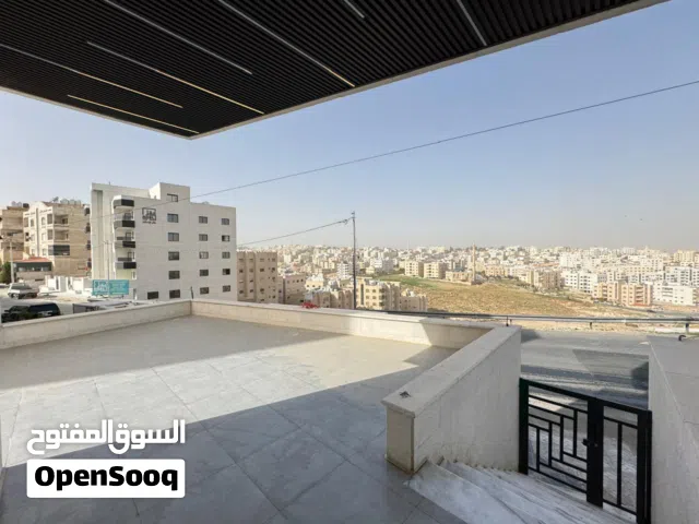 شقه أرضية فاخرة  للبيع في طبربور مع ترسات واسعه واطلالة مميزة