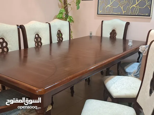 طاوله طعام 8كراسي خشب بني