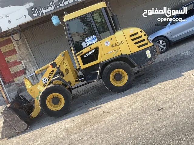 تراب زراعي احمر او اسود نخب موجود جرافة صغيرة