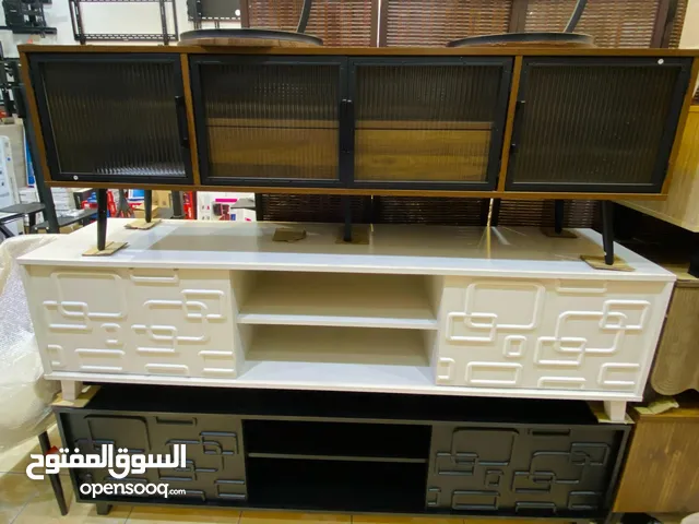 طاولات تلفاز خشبية متعددة التصميمات مقاسات 160 إلى 180 سم جودة عالية وأناقة لمنزلك