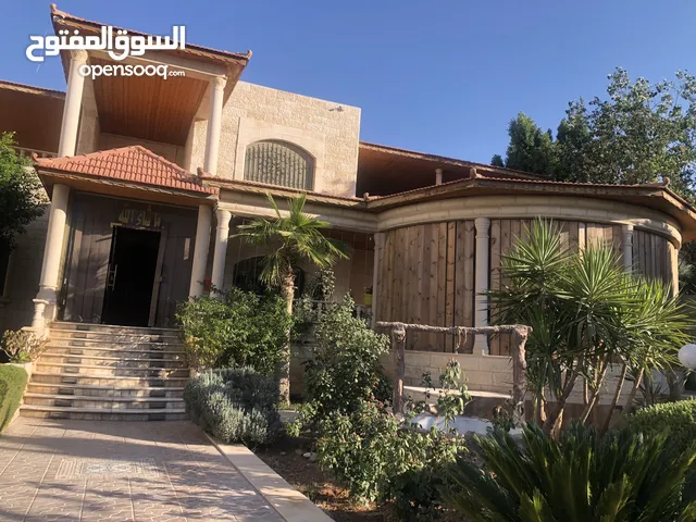 700m2 More than 6 bedrooms Villa for Sale in Zarqa Dahiet Al Madena Al Monawwara