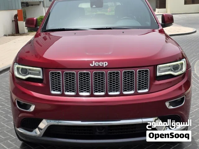 2015 Jeep Grand Cherokee Summit with GCC Specs - Red SUV.