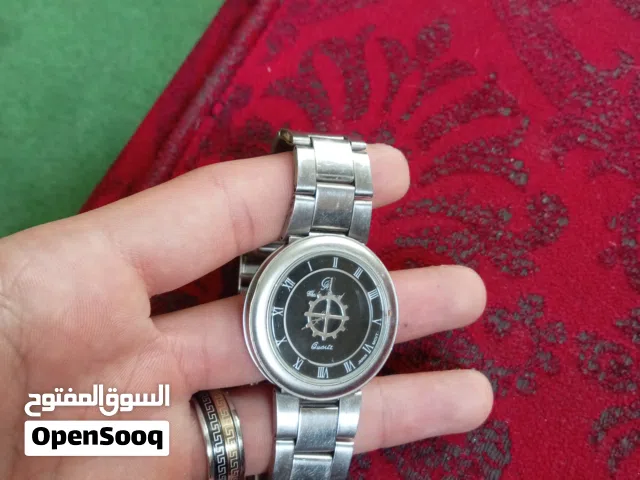 ساعة Quartz كلاسيكية (بطارية جديدة)