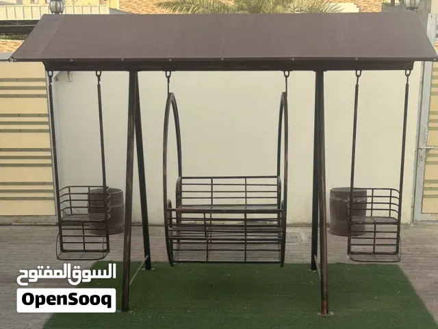 الأرجوحة مع مظلة