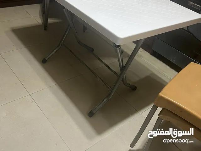 طاولة طوي ابيض
