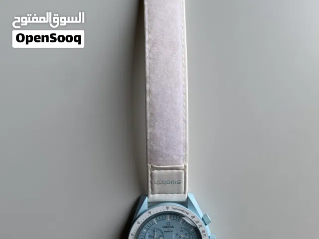 ساعه أوميجا x سواتش اصليه مع الفاتوره  بحاله ممتازه