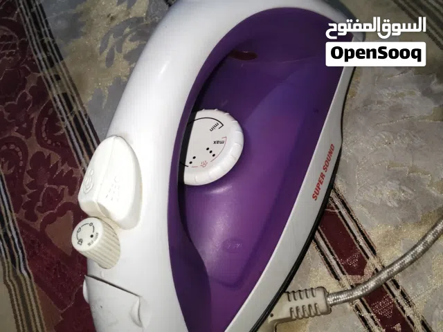 مكواه بخار بالتربيزه بتاعتها