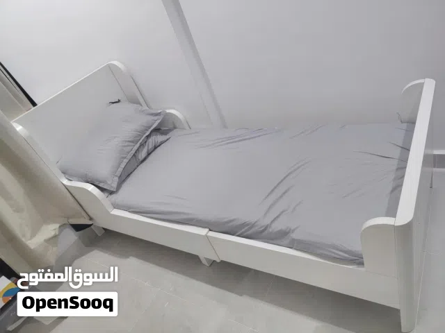 للبيع سرير أطفال إيكيا قابل للتمديد مع الفرشة الأصليةIKEA BUSUNGE Extendable Kids Bed