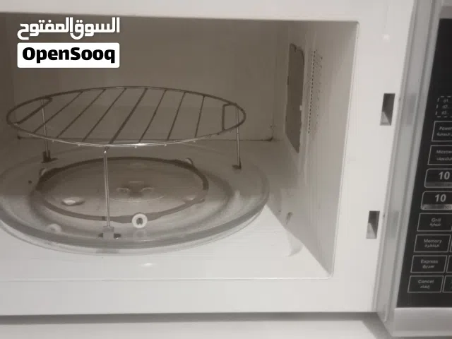 TIT brand appliance, specifically model TM-43SG. Microwave Mode: 1500 WattsGrill Mode: 1250 Watts