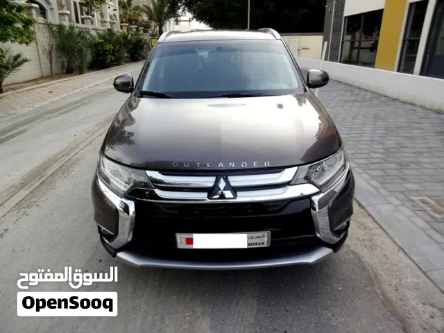 Mitsubishi Outlander 2.4 L 2016 Brown 7 Seat AWD Well Mainatained Urgent Sale