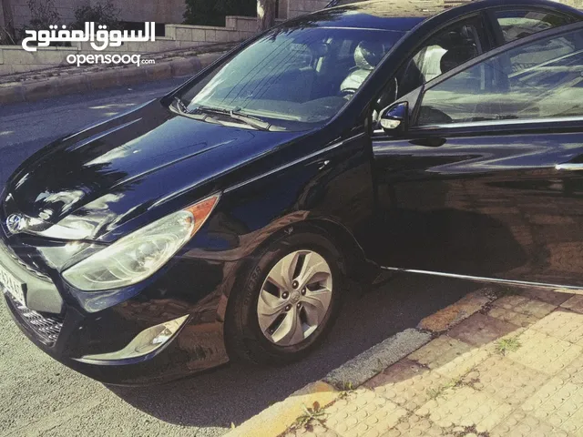 هونداي سوناتا هايبرد موديل 2015 مميزة لون اسود ملوكي