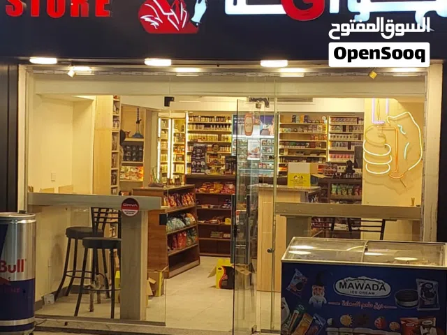 محلات للبيع علي عباس العقاد مباشر امام الحديقه الدوليه ومتأجره إيجار سنوي يعني افضل استثمار