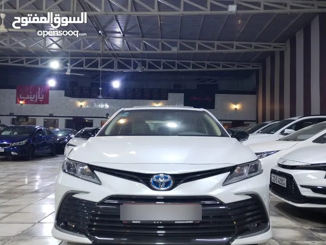 تويوتا كامري موديل 2024 فئة هايبرد وكالة عبد اللطيف السعودي صناعة ياباني اصلي عداد المسافة 14 الف