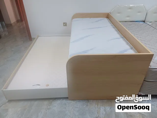 Bed frame with underbed and all required mattresses.
