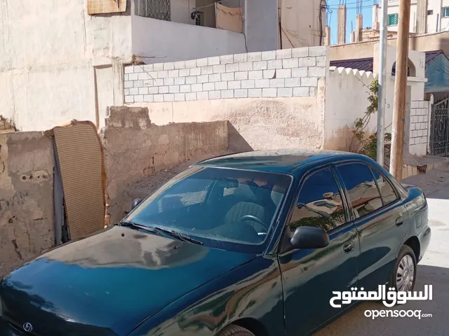 هونداي اكسنت توماتيك اصلي موديل 95 مكيف ثلاجه ترخيص شهر 3/2026 سياره زي ما بالصور واحلى