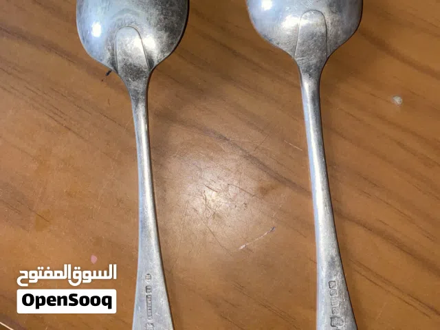 معالق عتيقة فيها طابع