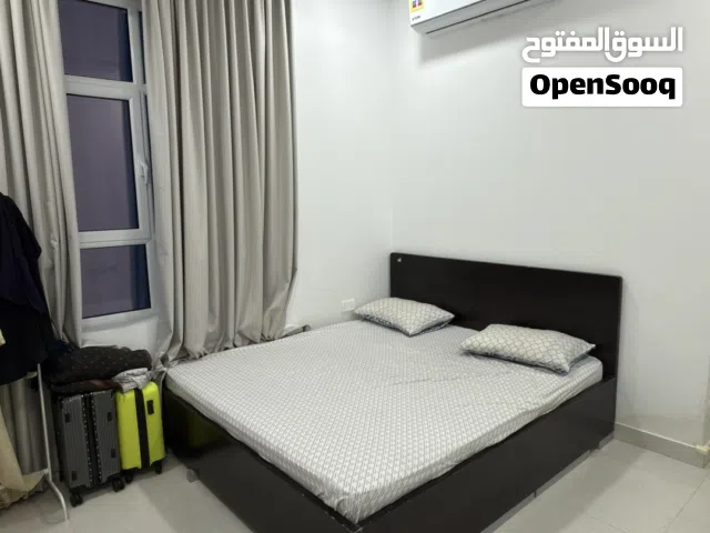 King size bed with side tables and mattress