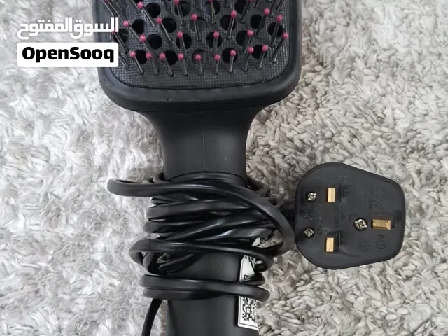 الفرشاة المسطحة الكهربائية لتجفيف  وتصفيف الشعر ماركة Revlon