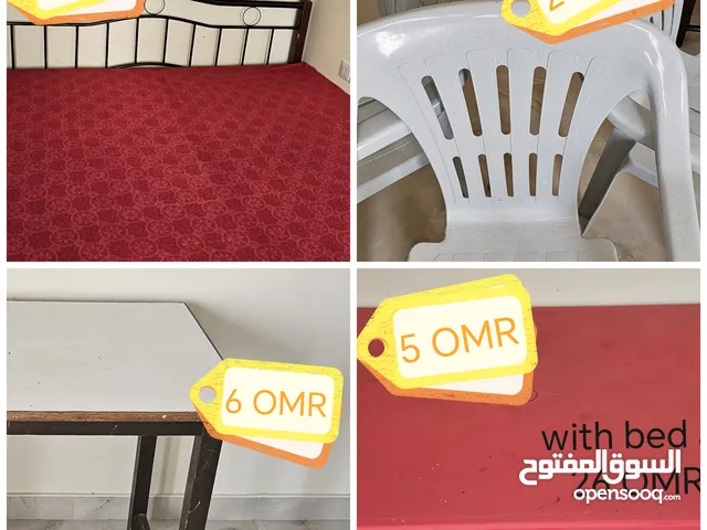 king size iron bed, Large red table, 3 plastic chair, Wooden table