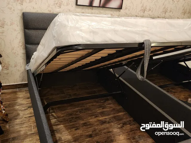 Bed for one person/single bahraini wood - new. Grey color with the mattress, beneath is storage