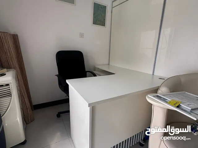 Office table with drawers and chair