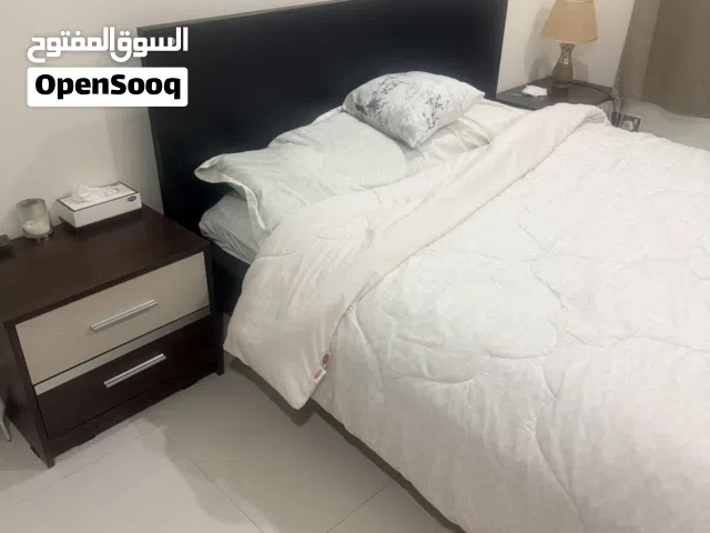 Queen size Bed, Mattress and two side tables