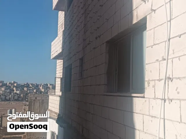 عمارة للبيع ماركا شماليه حي المزارع بالقرب من مدرسة ذات النطاقين للبنات