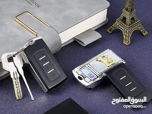 ميزان جيب رقمي الكتروني صغير على شكل مفتاح سيارة  يزن حتى 100 غرام