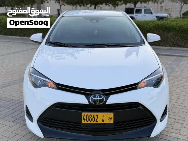 تويوتا كرولا 2019 ابيض وارد