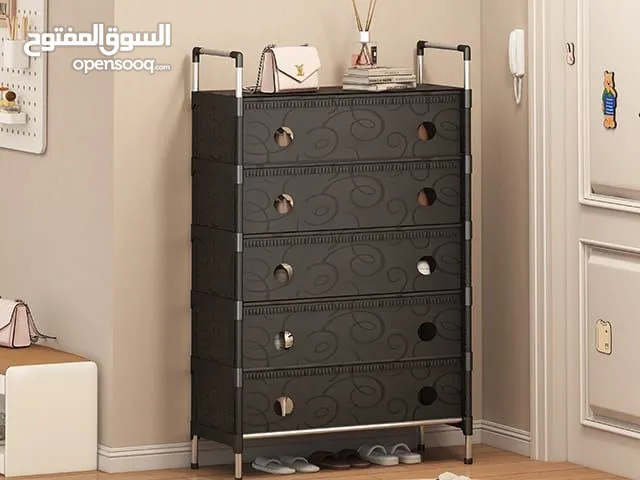 مدخل منزلك أو غرفتك إلى مساحة مرتبة وعصرية مع خزانة الأحذية متعددة الأدراج ذات التصميم العصري .