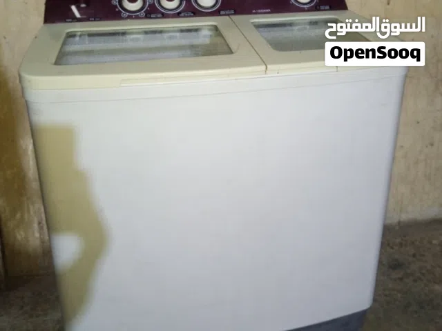 غساله بيها مجال غسل و تنشيف