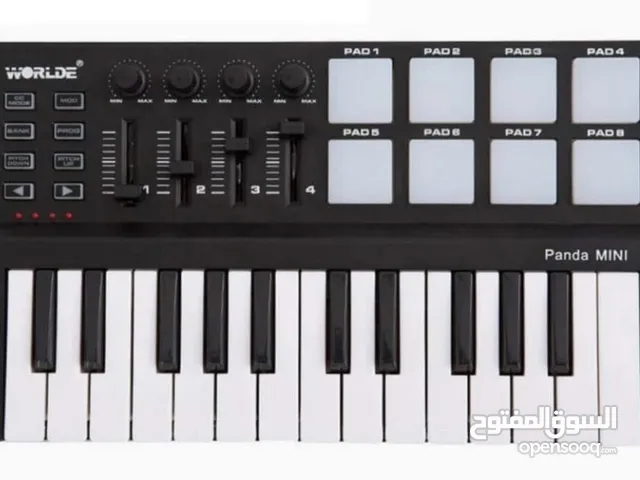Worlde Panda MINI Portable 25 Keys USB MIDI Keyboard MIDI Controller with Drum Pad ( new )