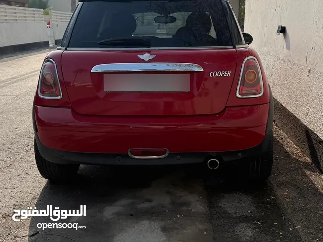 2011 sports mini cooper ( gcc spec and excellent condition for 2011 model and only 83000 km running)