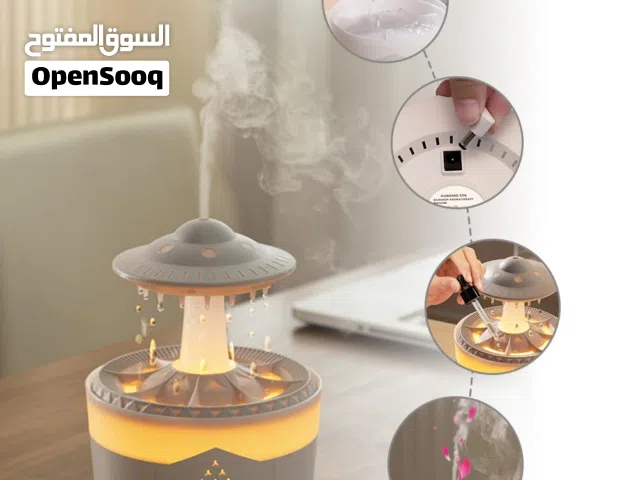 جهاز ترطيب هواء بشكل صحن طائر (UFO) مزوّد بإضاءة LED ملوّنة، يغيّر الألوان ويُطلق بخاراً خفيفاً لترط