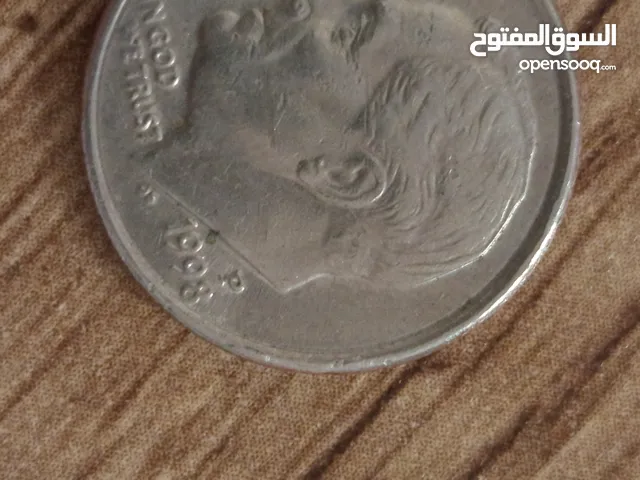 بقيمه اعلى بسبب التضخم المالي باميركا ONE DIME الامريكيه من سنة 1998