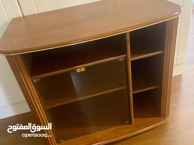 TV stand in wood and glass Like new · Brown and Transparent · Glass and Wood