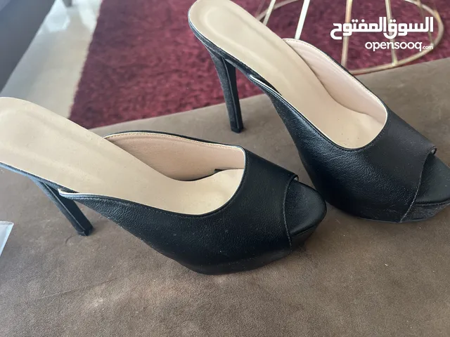 Black With Heels in Manama