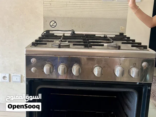 cuisinière four 4 feux plaque et four