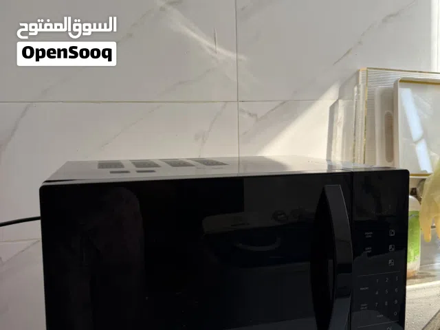 Candy 25 - 29 Liters Microwave in Muscat