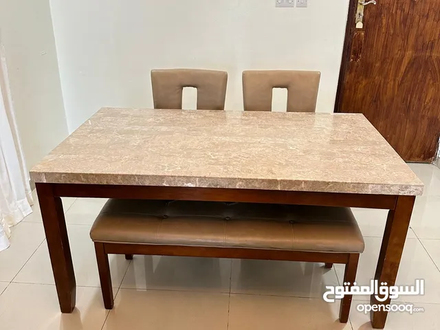 Marble top dining table and chairs (2 normal and 2 child high chairs)