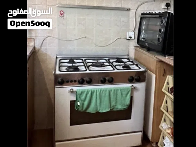 فرن كهرباء وغاز وفرن