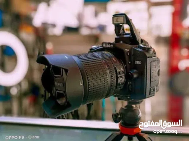 كامره نيكون D90 +عدسه رياضي 300-700 وملحقاتهه