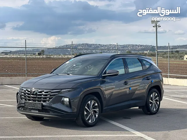 هونداي توسان/2022 فل الفل بدون فتحة سقف  2x4 ///240Hp بنزين + كهرباء  ( Haybrid) 1600cc