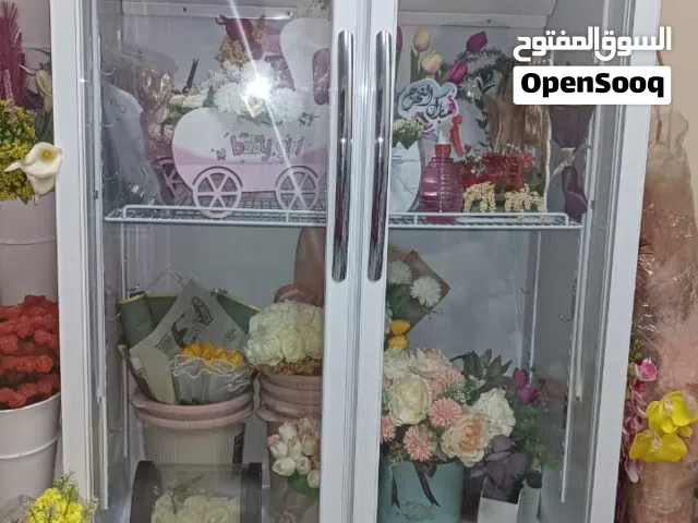 ثلاجة ورد أو مشروبات كبيرة