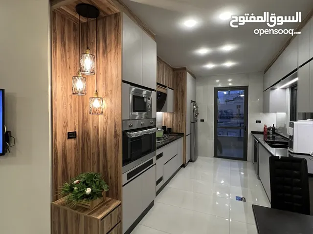 مطابخ خشب واللمنيوم جودة عالية بكفالة 10 سنوات