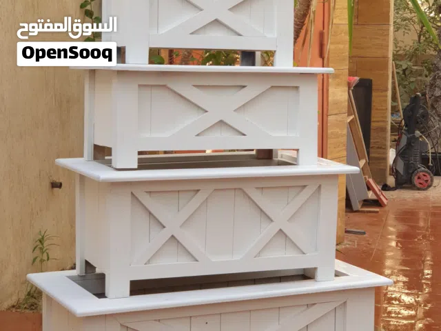 احواض نباتات بالخشب الطبيعى
