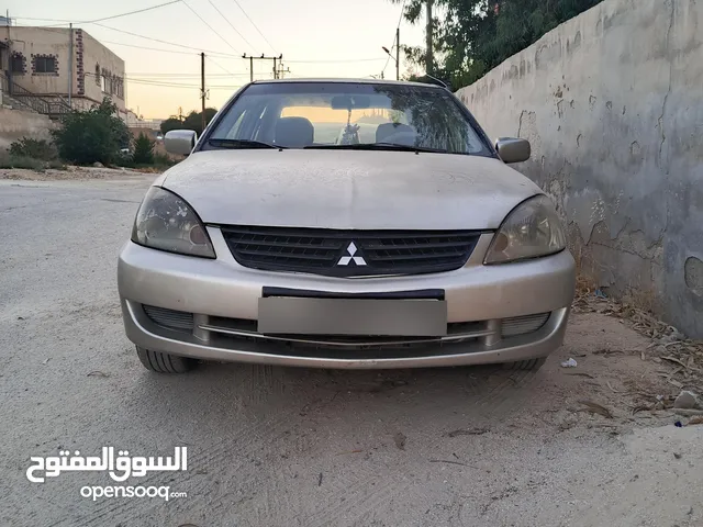 لانسر موديل 2005 قير عادي متور 1300